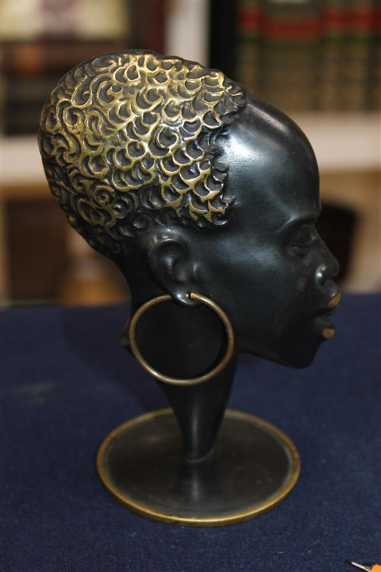 Richard Rohac. An Austrian patinated bronze model of an African female head in profile, 6in.